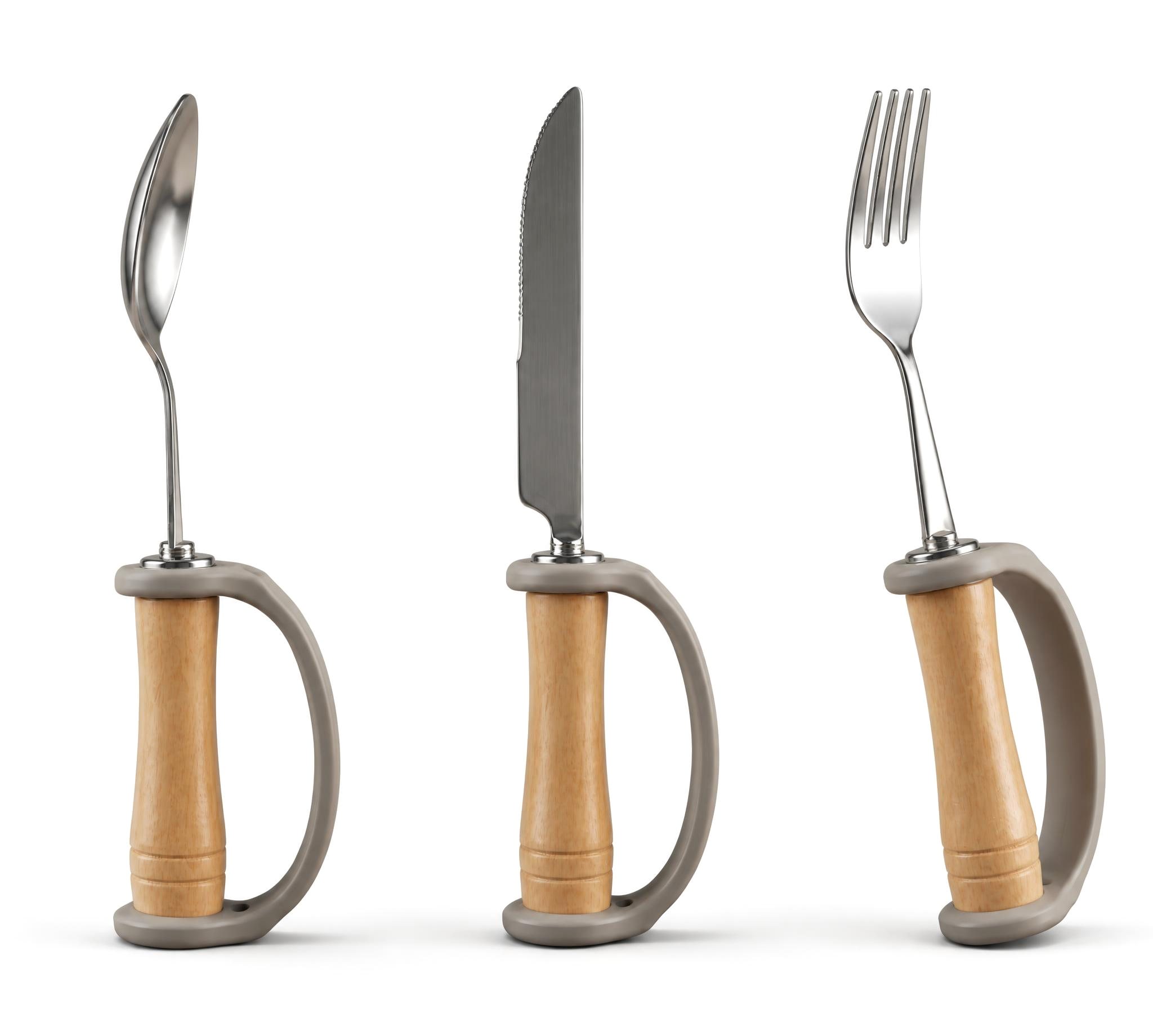 A spoon, knife and fork standing upright, each with a turned timber handle and a soft grey loop for support.